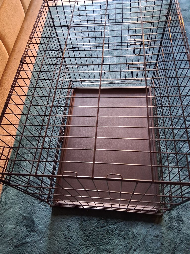 Dog cage, folding, in good condition