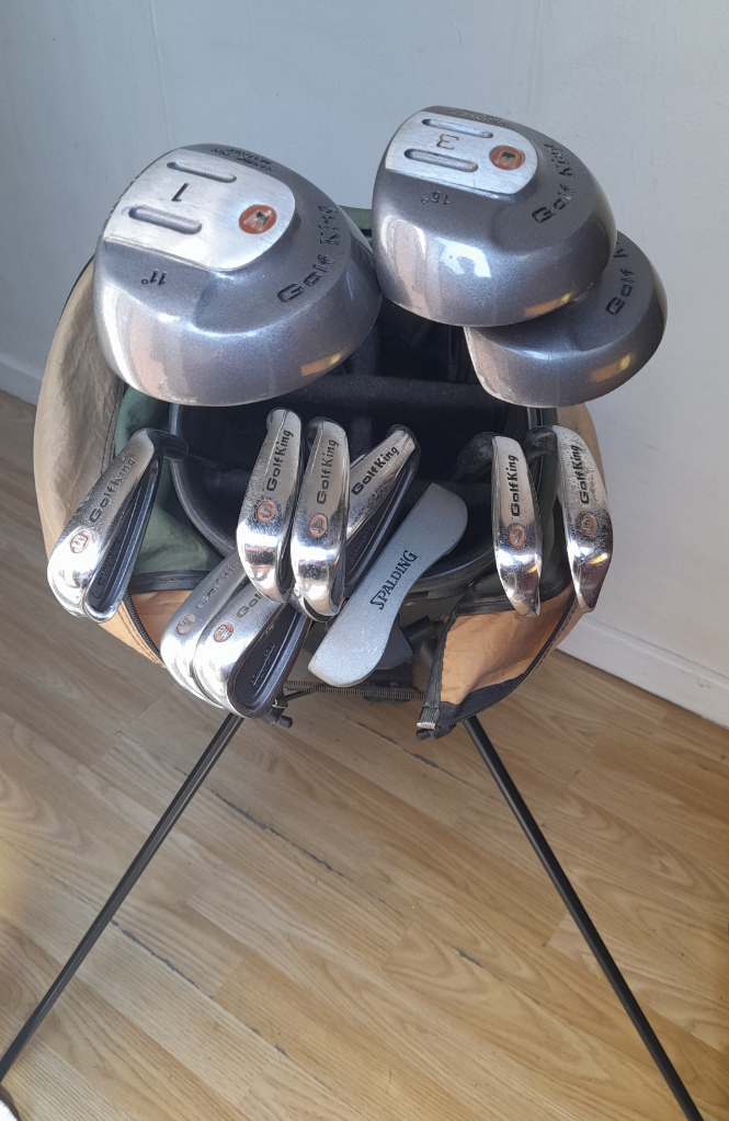Full set of golf clubs with stand bag irons, woods, driver, putter