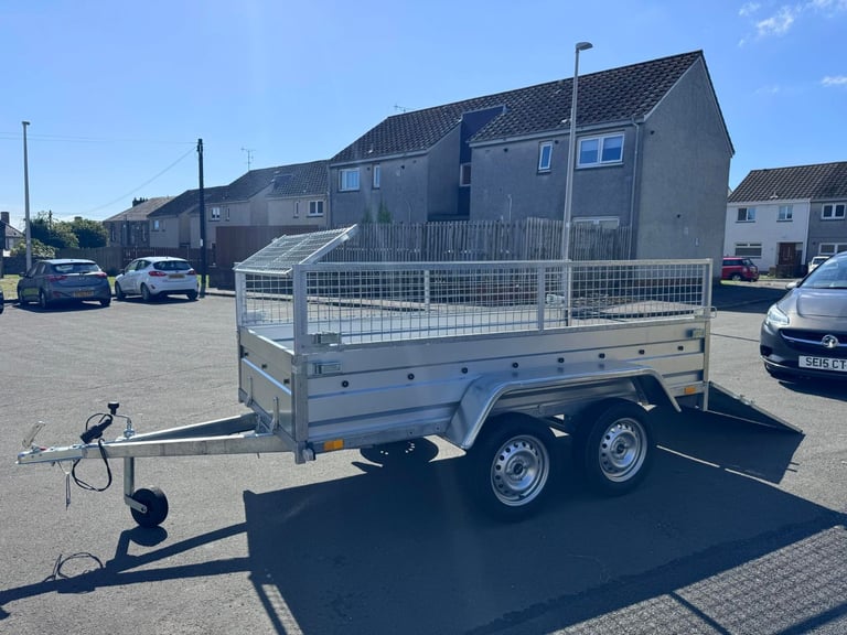 BRAND NEW 8,7ft X 4,2ft TWIN AXLE NIEWIADOW TRAILER WITH 40CM MESH AND A RAMP 750KG