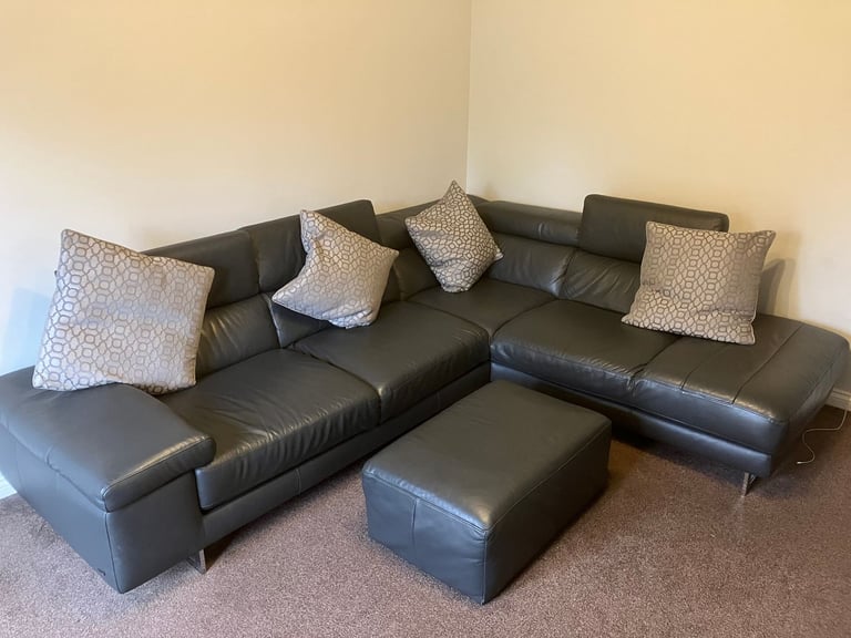 image for Leather suite with footstool.