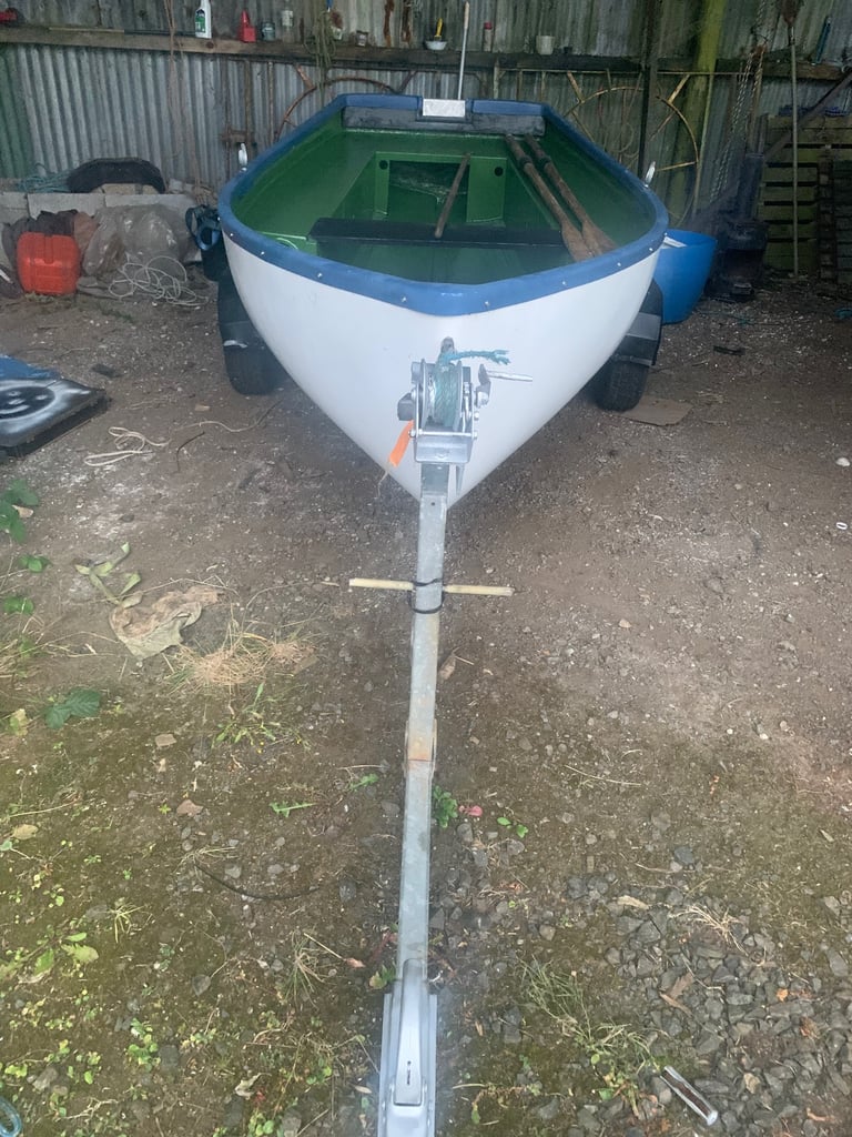 12 ft fibreglass boat and galvanised trailer 