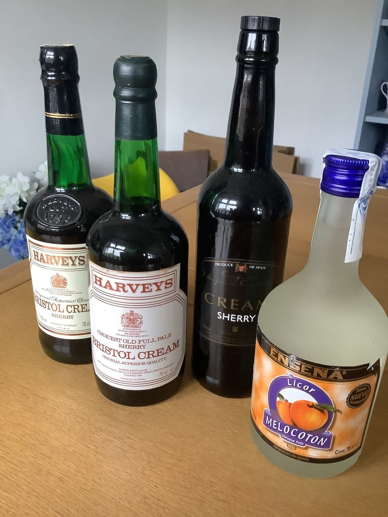 image for Three Bottles of Sherry and One Peach Liqueur. New Unopened.