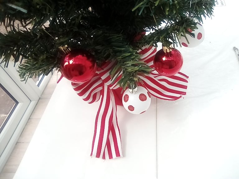 As new small Christmas tree with hanging baubles etc included.