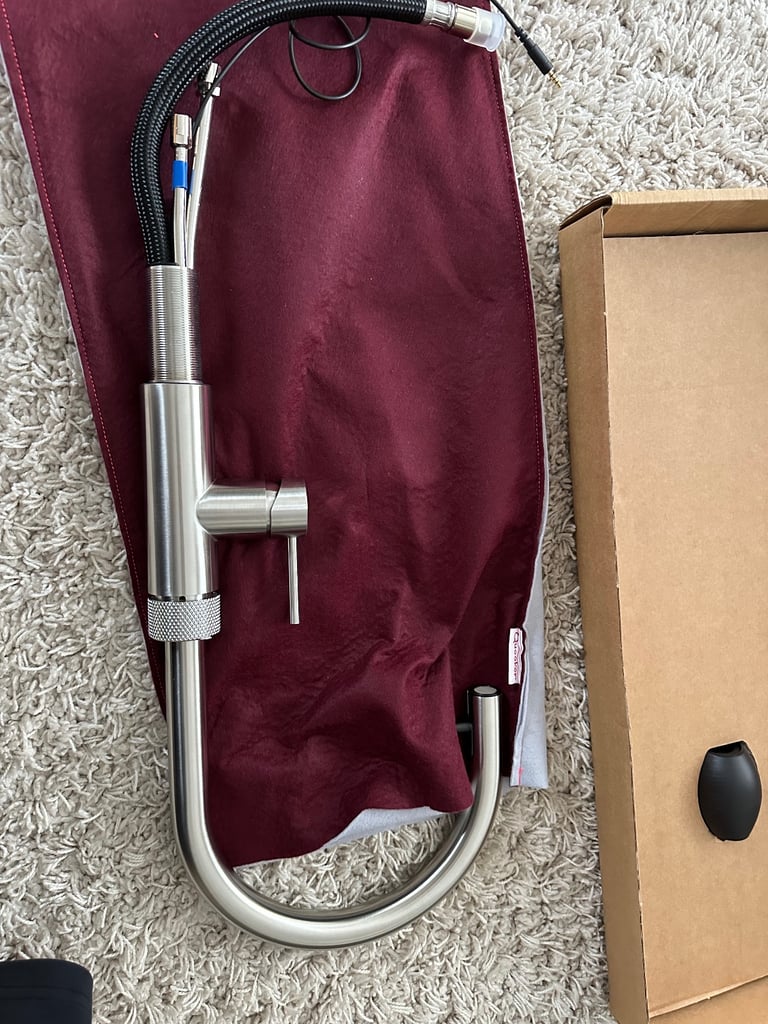 Quooker stainless steel round Fusion tap.