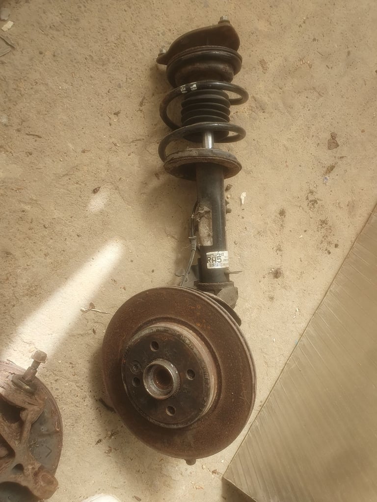 Mini one strut leg, o/s/f front complete used condition 