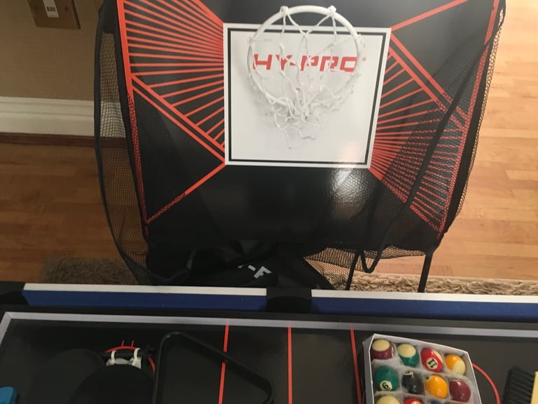 Four in one games table. Snooker,table tennis, air hockey and basketball.