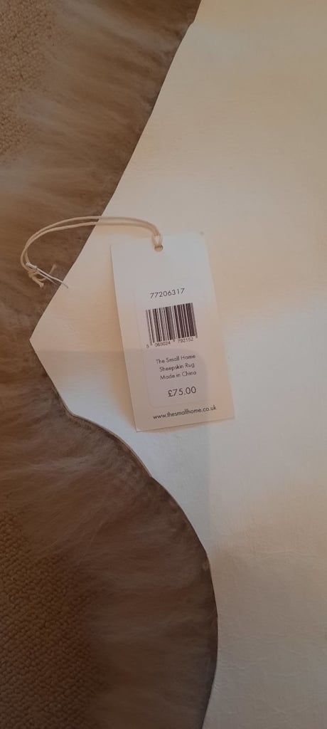 Brand new John Lewis sheepskin rug 