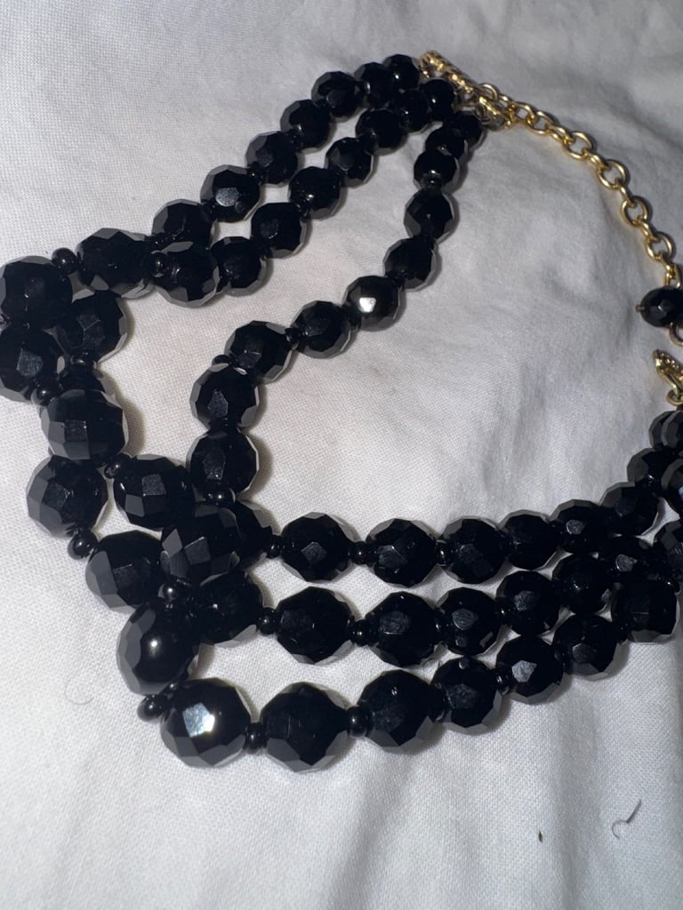 Multi layer black onyx gold tone necklace 