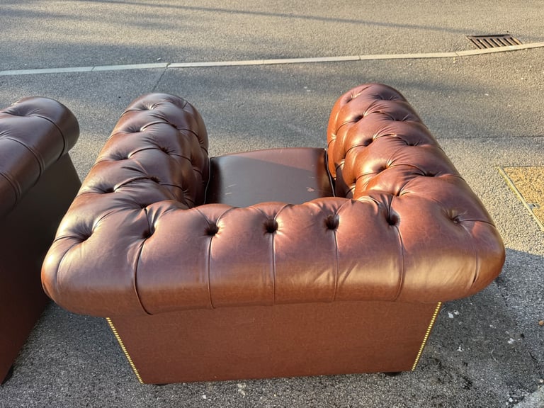 Pair of chesterfield faux brown leather club armchairs 