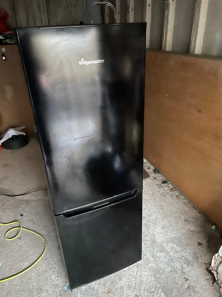 Fridge freezer (shiny black) very stylish in Cardiff City Centre