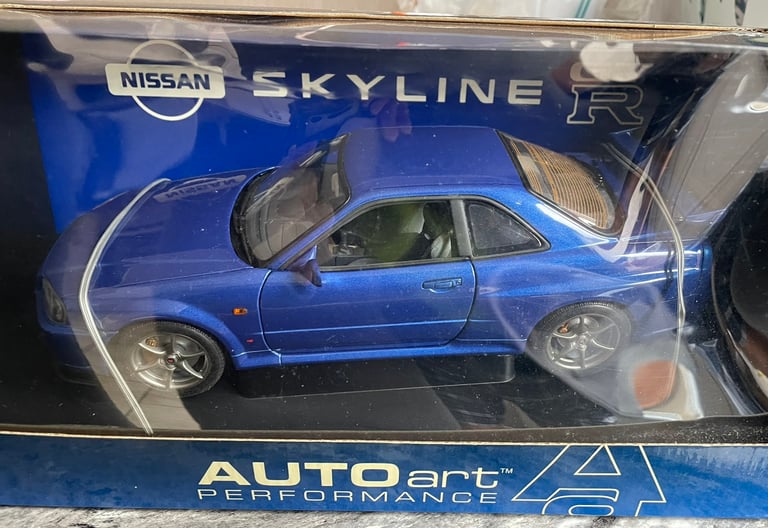 image for Autoart Nissan GTR R34 1/18