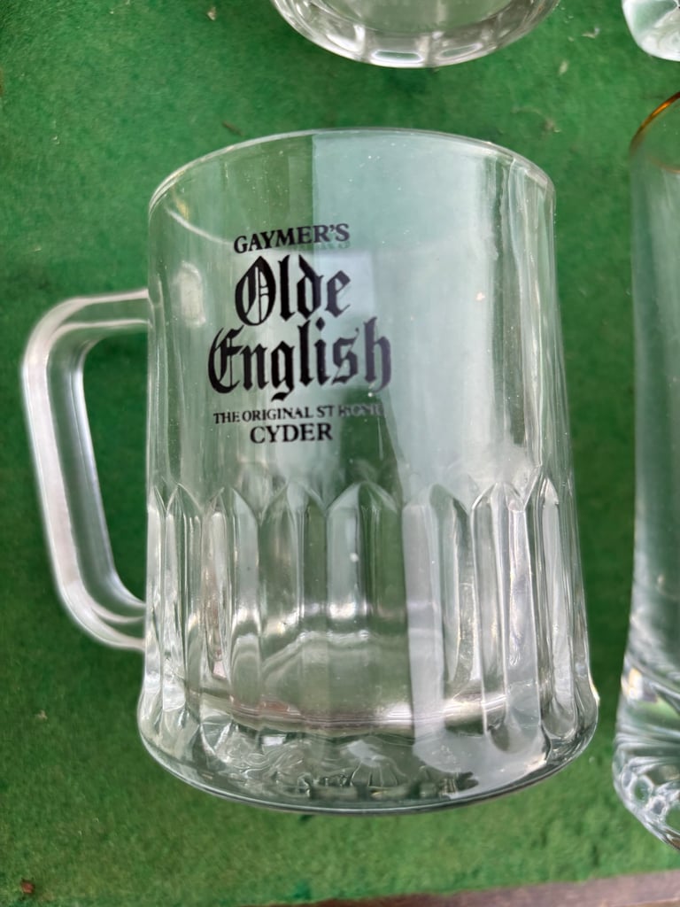 Mixed lot of half pint handled glasses some vintage 