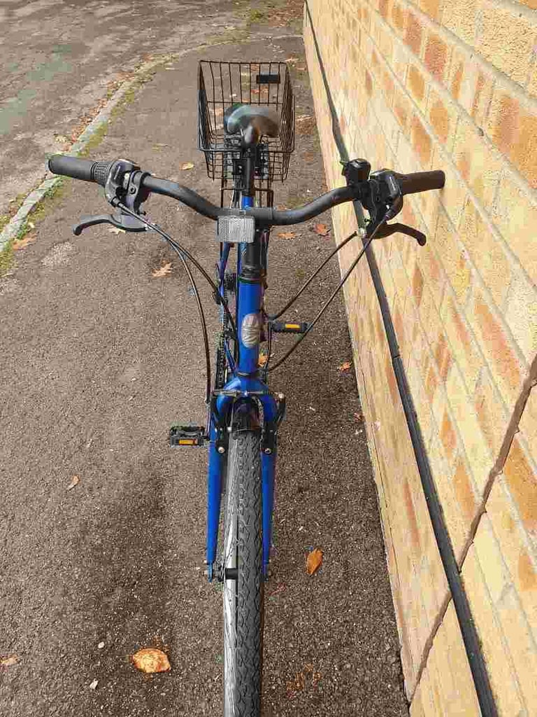 Lightweight Aluminium Apollo Transfer Hybrid bike in good condition with rear basket
