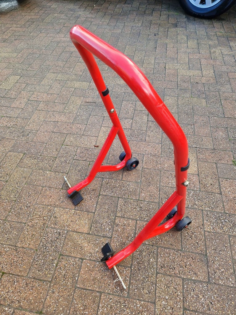 Paddock stand for swing arm