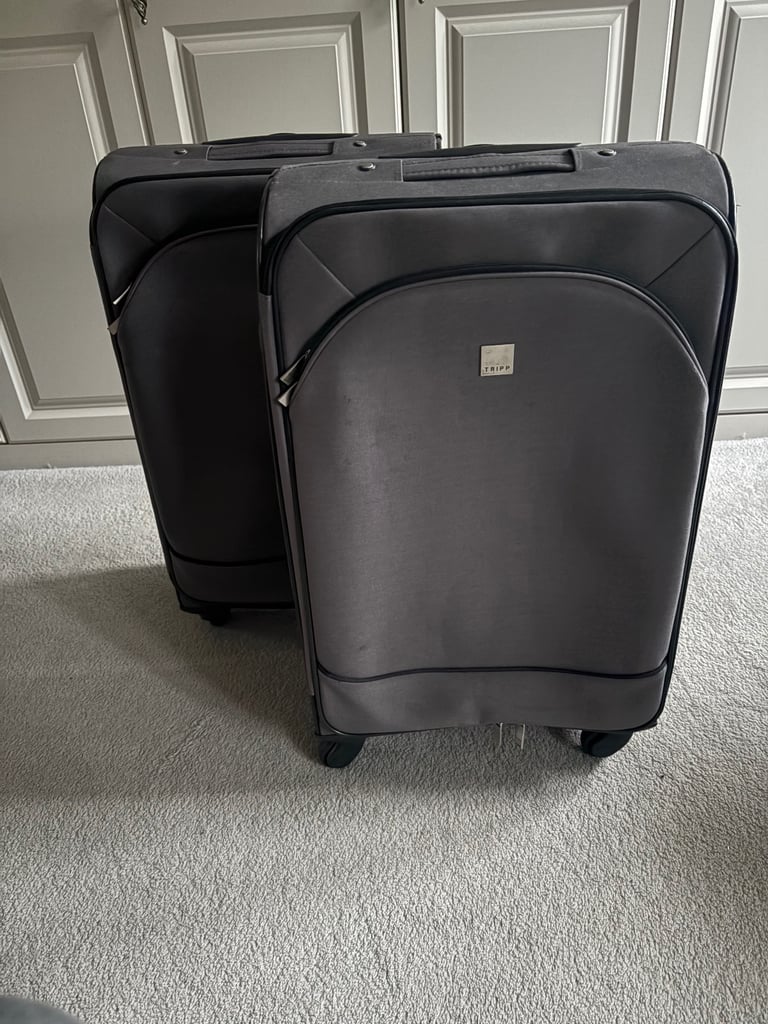 2 Medium Tripp suitcases 