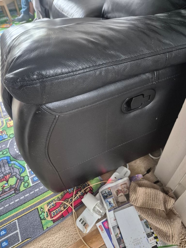 Two seater leather reclining sofa