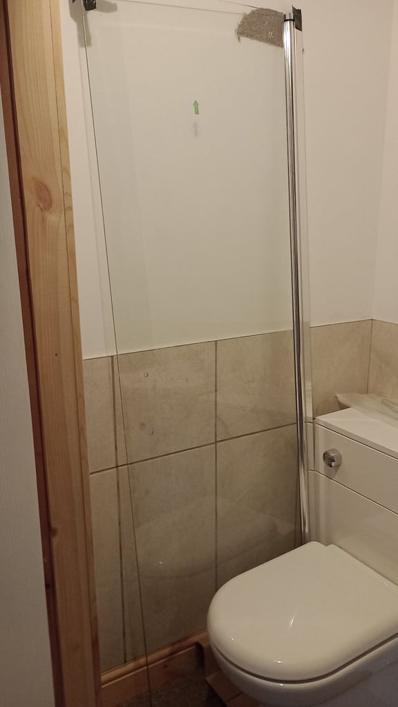 Unused shower screen.