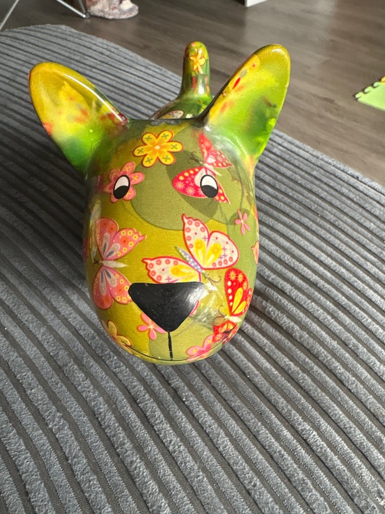 Pomme-pidon dog piggy bank 