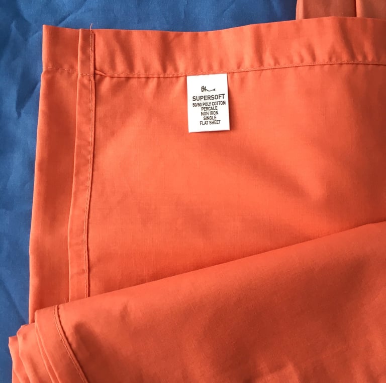 Co-ordinating set of terracotta single bed linen