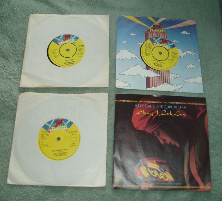 COLLECTION OF 4 ELECTRIC LIGHT ORCHESTRA VINYL SINGLES