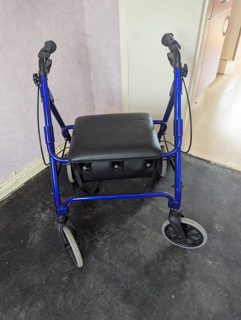 image for Four Wheeled Rollator with seat and brakes