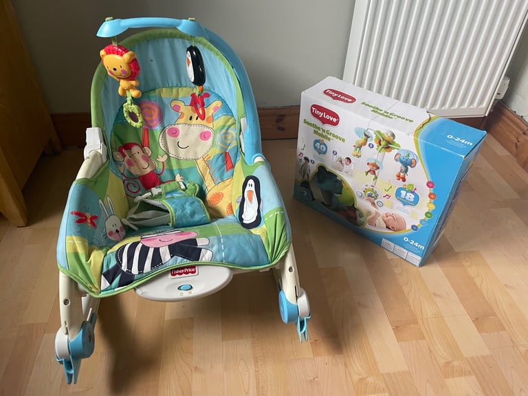Baby rocker chair and mobile, plus changing mat