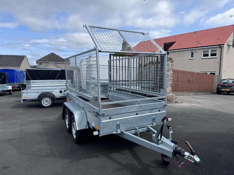 NEW 8,2ft X 4,3ft (BC752) TWIN AXLE TRAILER WITH 80CM MESH & RAMP 1300KG