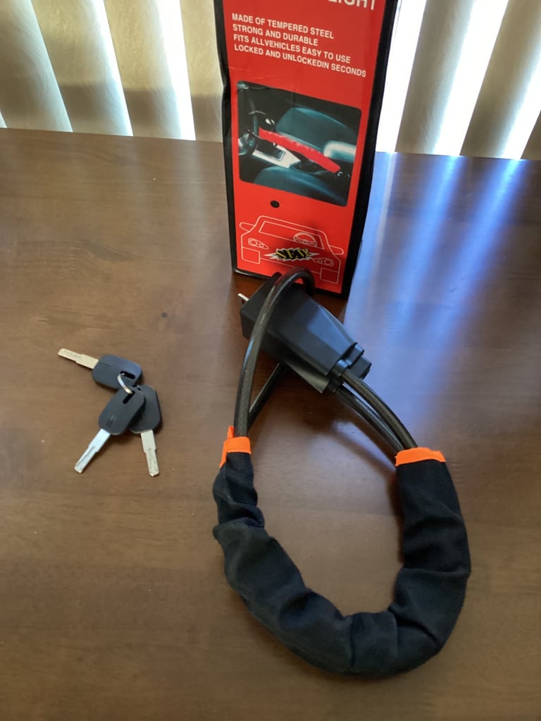 Brand new Boxed Tough steering wheel lock.