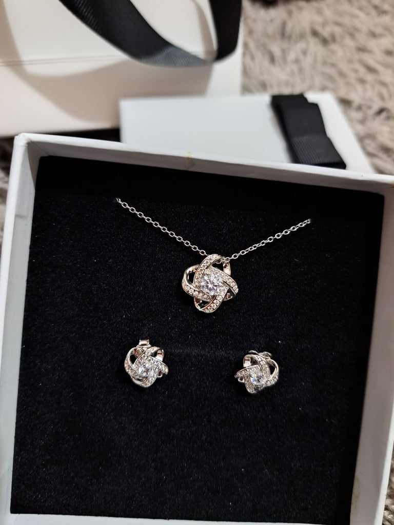 image for Interlock hoop neckless earrings 