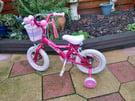 Kiddies pink Apollo Sparkle bicycle.