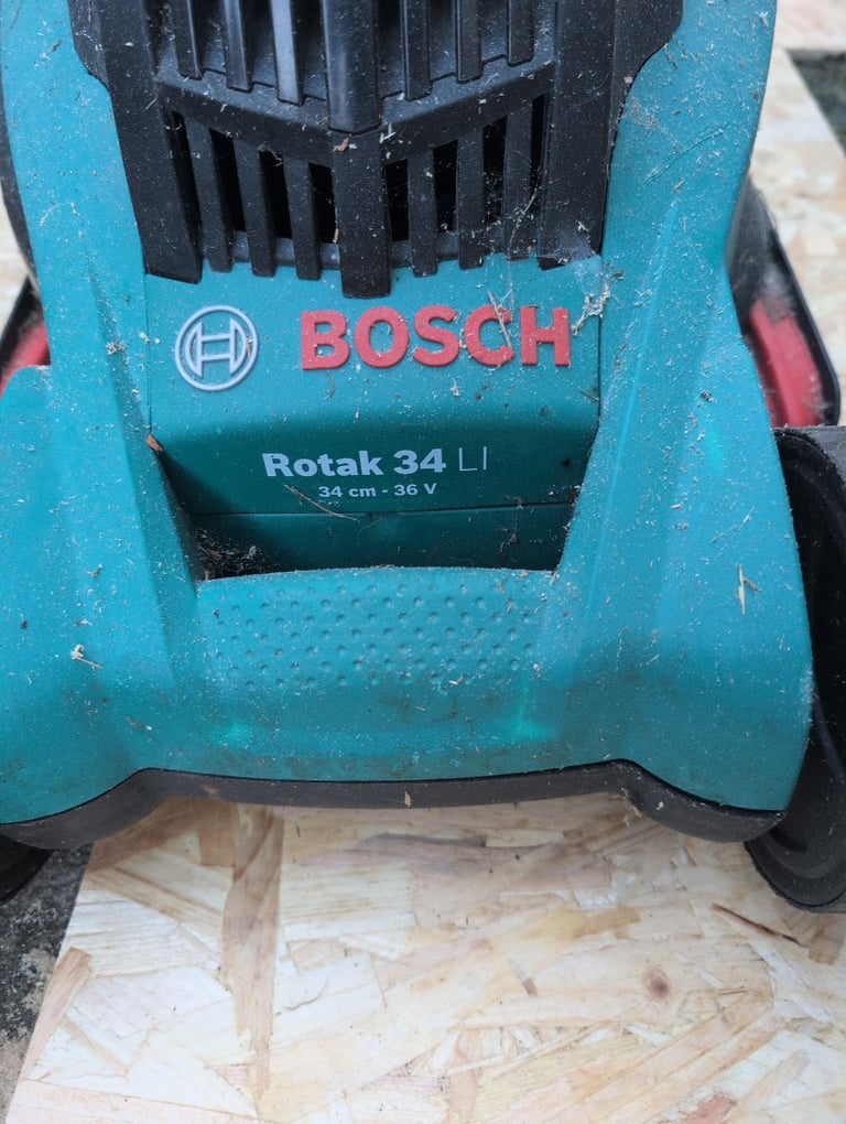 image for Bosch cordless lawn mower ( needs charger )