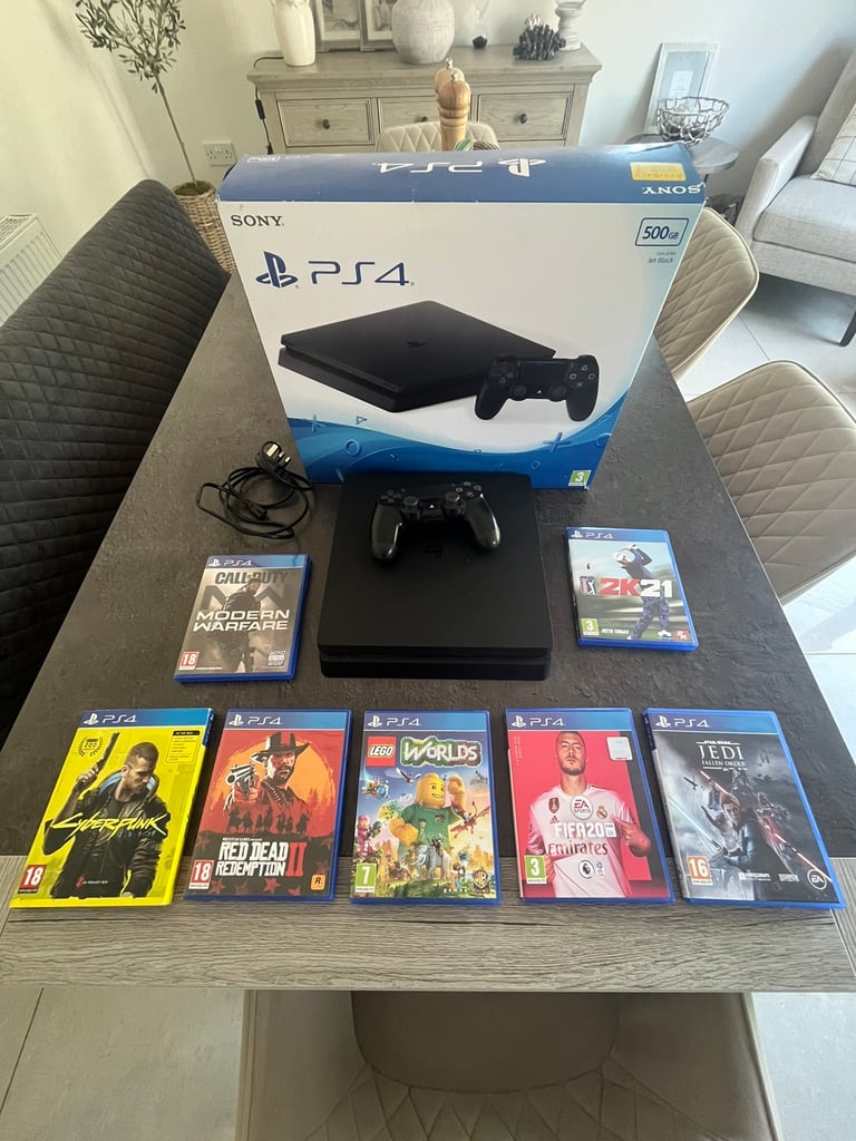 PS4 SLIM 500gb. BOXED with 1 CONTROLLER & GANES BUNDLE