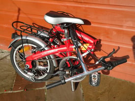 Folding bike, 6 gears, 16 inch wheels, rear rack , mud guards, folds compactly