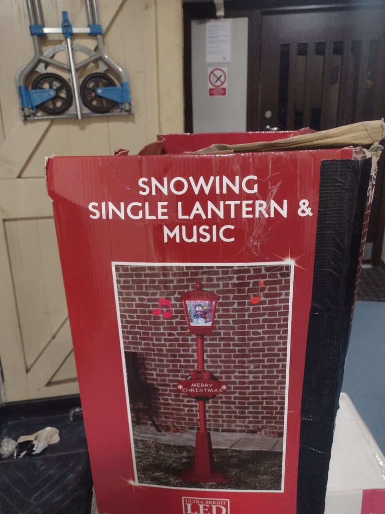 Snowing and musical single lantern £70