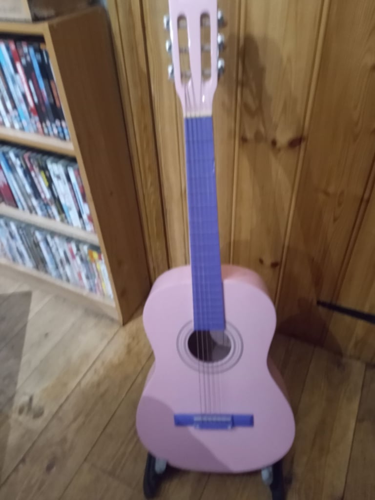 Child's pink guitar 