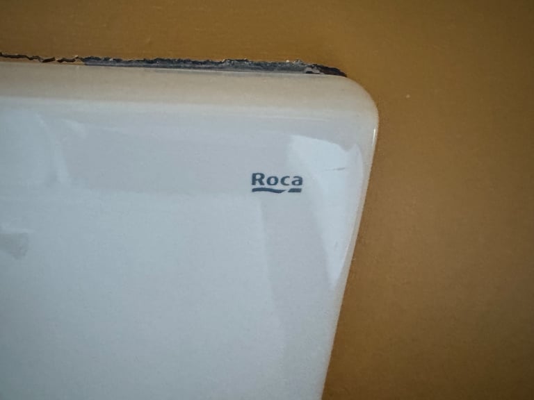 Roca wall mounted sink with back splash