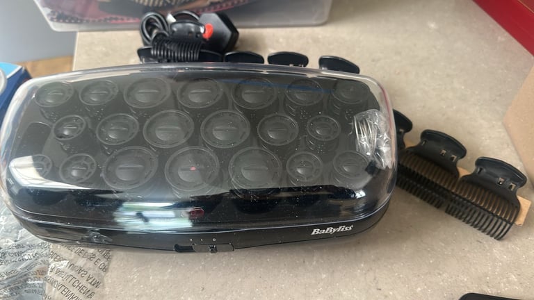 image for Brand new never opened or used ceramic hair rollers 