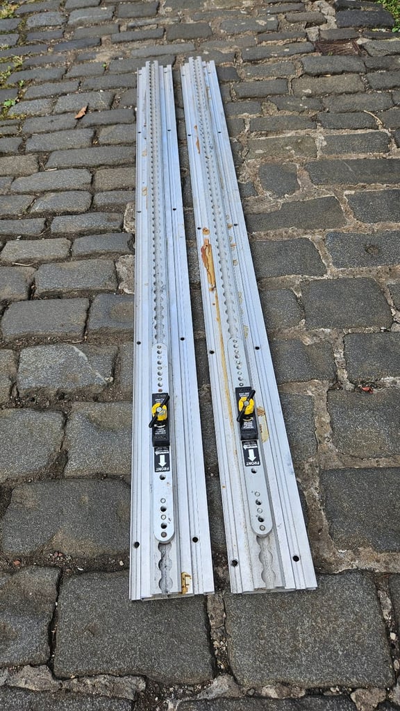 Sold 2 Unwin heavy duty floor rail tracks with clamps and end pieces.