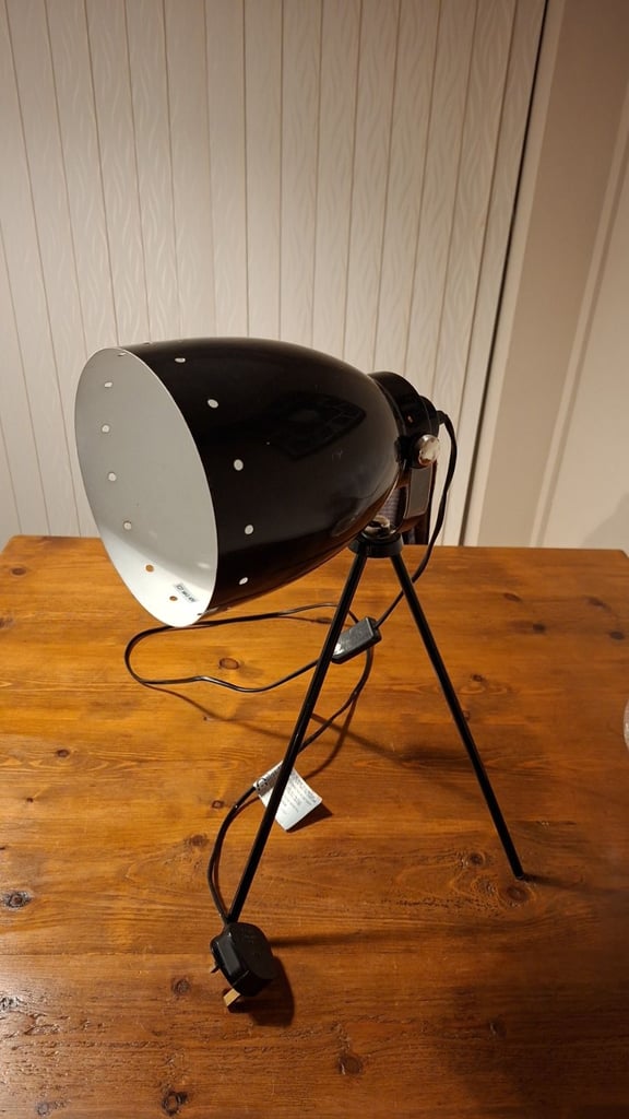 Black tripod lamp