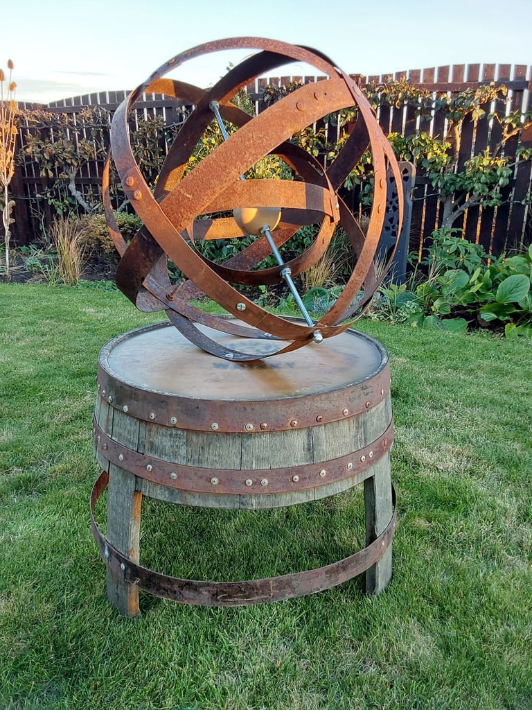 Garden art from whisky barrel materials 
