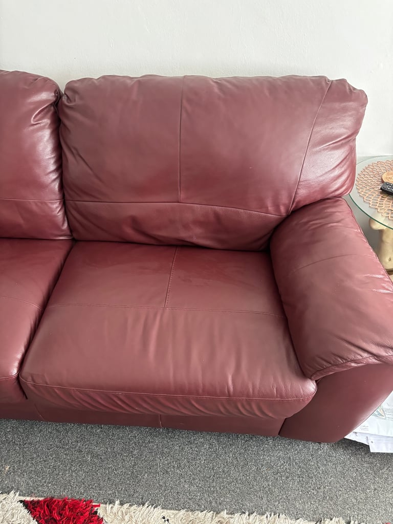 Burgundy leather 3 seater and chair 