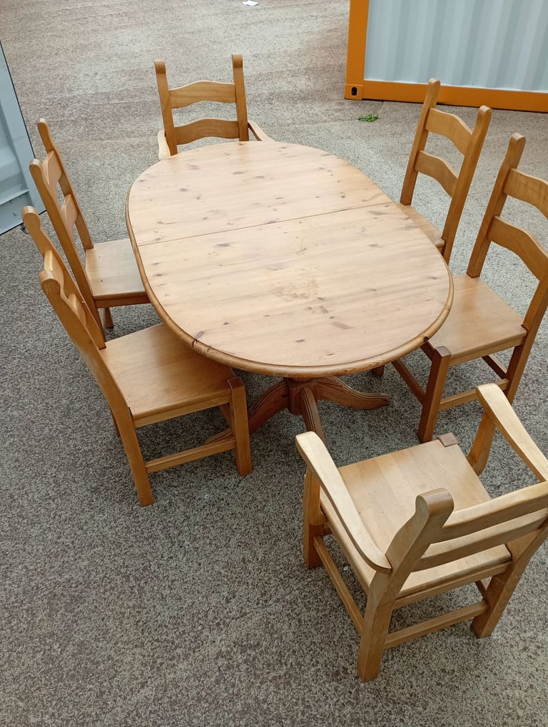Pine dining table and 6 chairs 