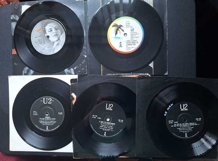 U2 vinyl singles 8 including a double single