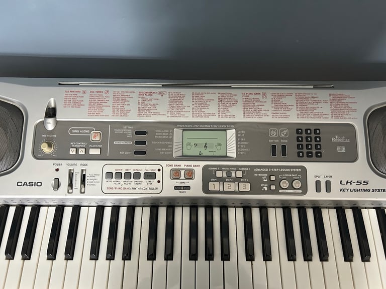 Casio Keyboard and Stand, with Learn to Play Function