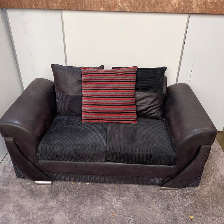 FREE DELIVERY TWO seater fabric sofa, black/brown , in good condition.