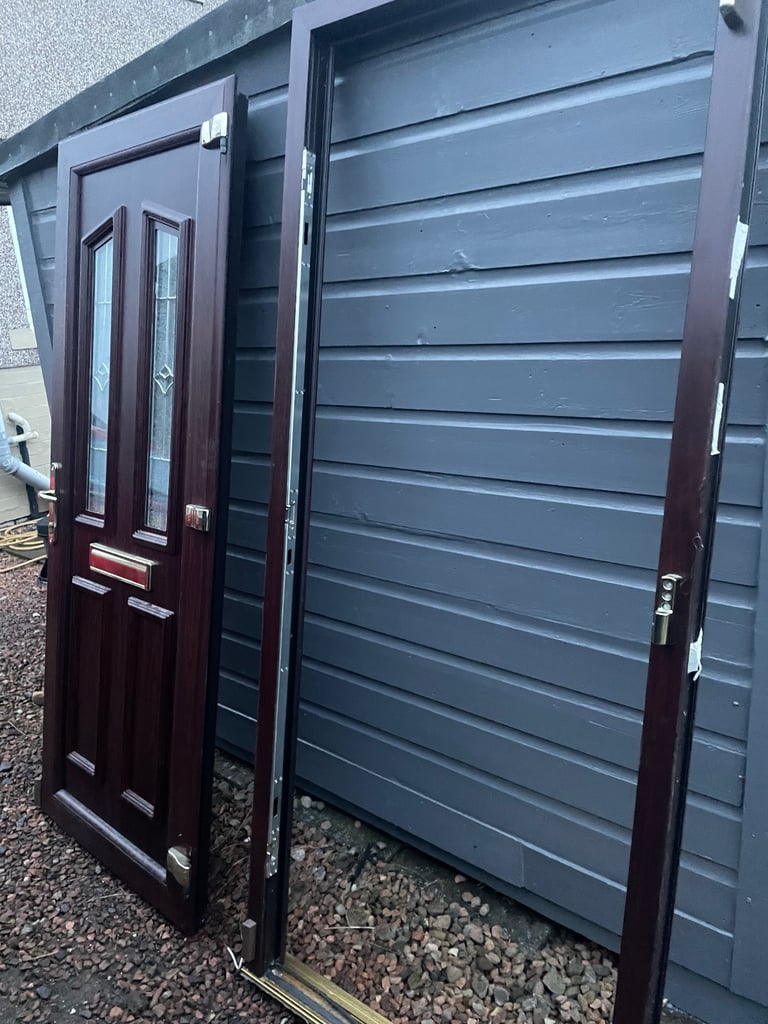 Upvc front door in rosewood 