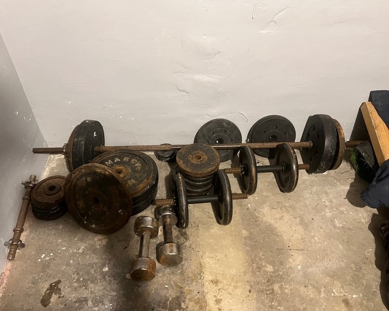 Weight lifting bench and 80 kgs worth of plates 