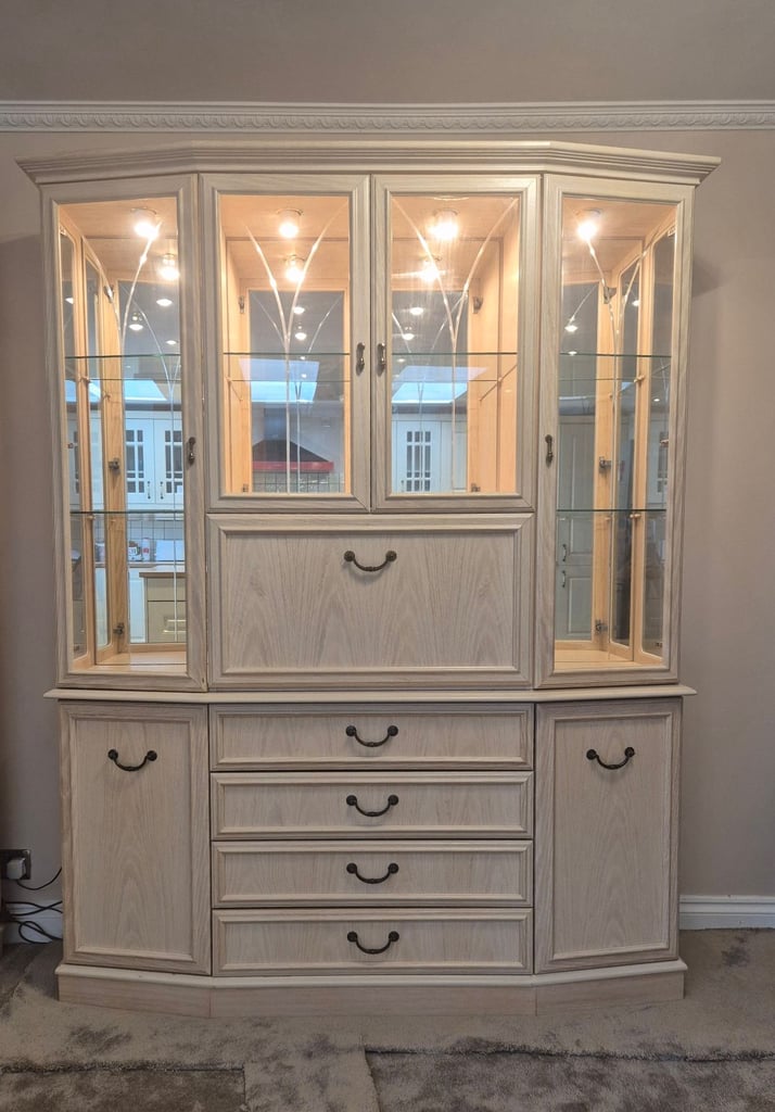 image for G Plan Limed Oak Large Display Mirrored Cabinet in limed oak with lighting and glass doors.