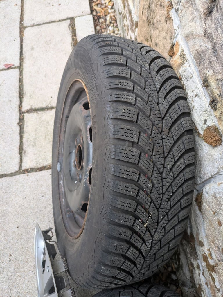 Winter Tyres 15 inch on Steel Rims with Hub Caps
