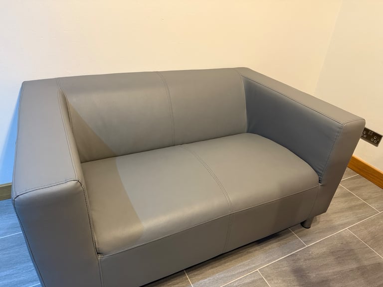 image for Grey two seater leather sofa 